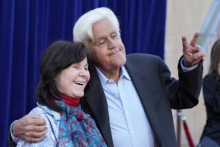Jay Leno and his wife Mavis pose at the Apr. 30 premiere of "Unfrosted" at the Egyptian Theatre