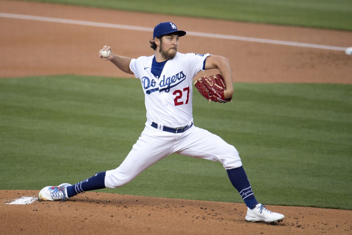 Dodgers starting pitcher Trevor Bauer throws during a game.