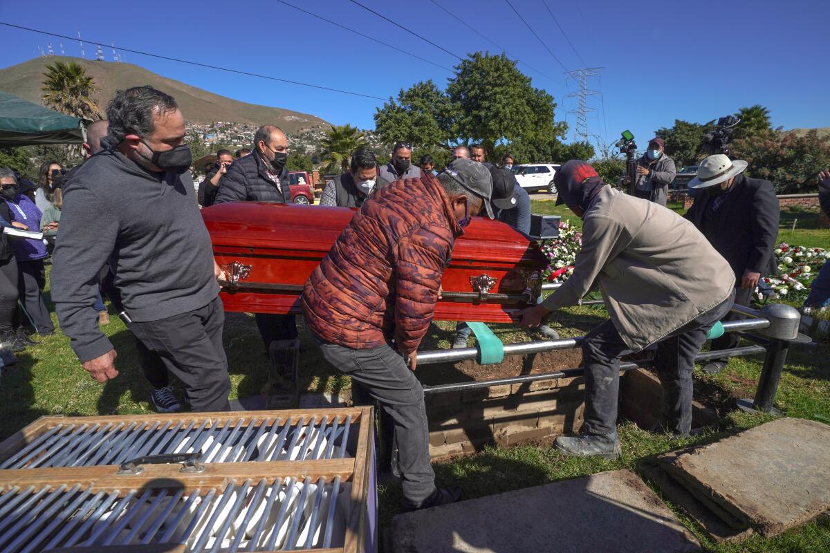 Friends and family carry the coffin containing the remains of murdered journalist Lourdes Maldonado