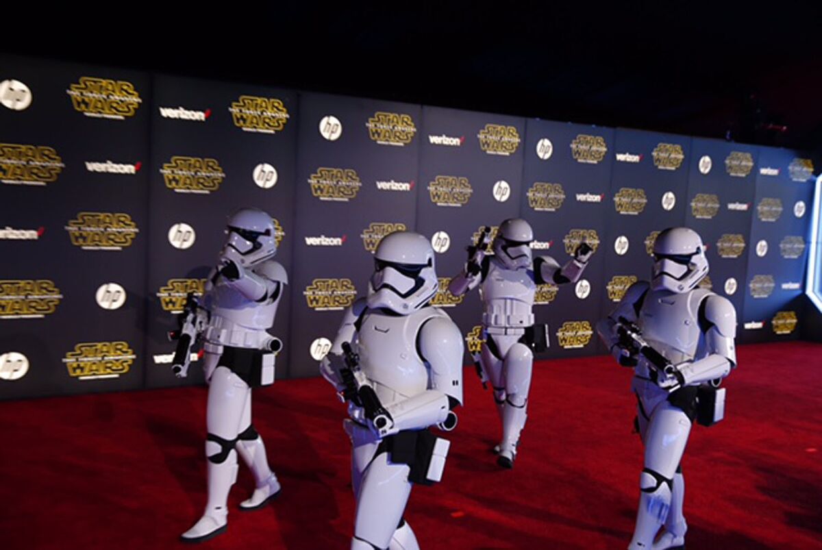 Stormtroopers drink in the spotlight on the red carpet -- while keeping order, of course.