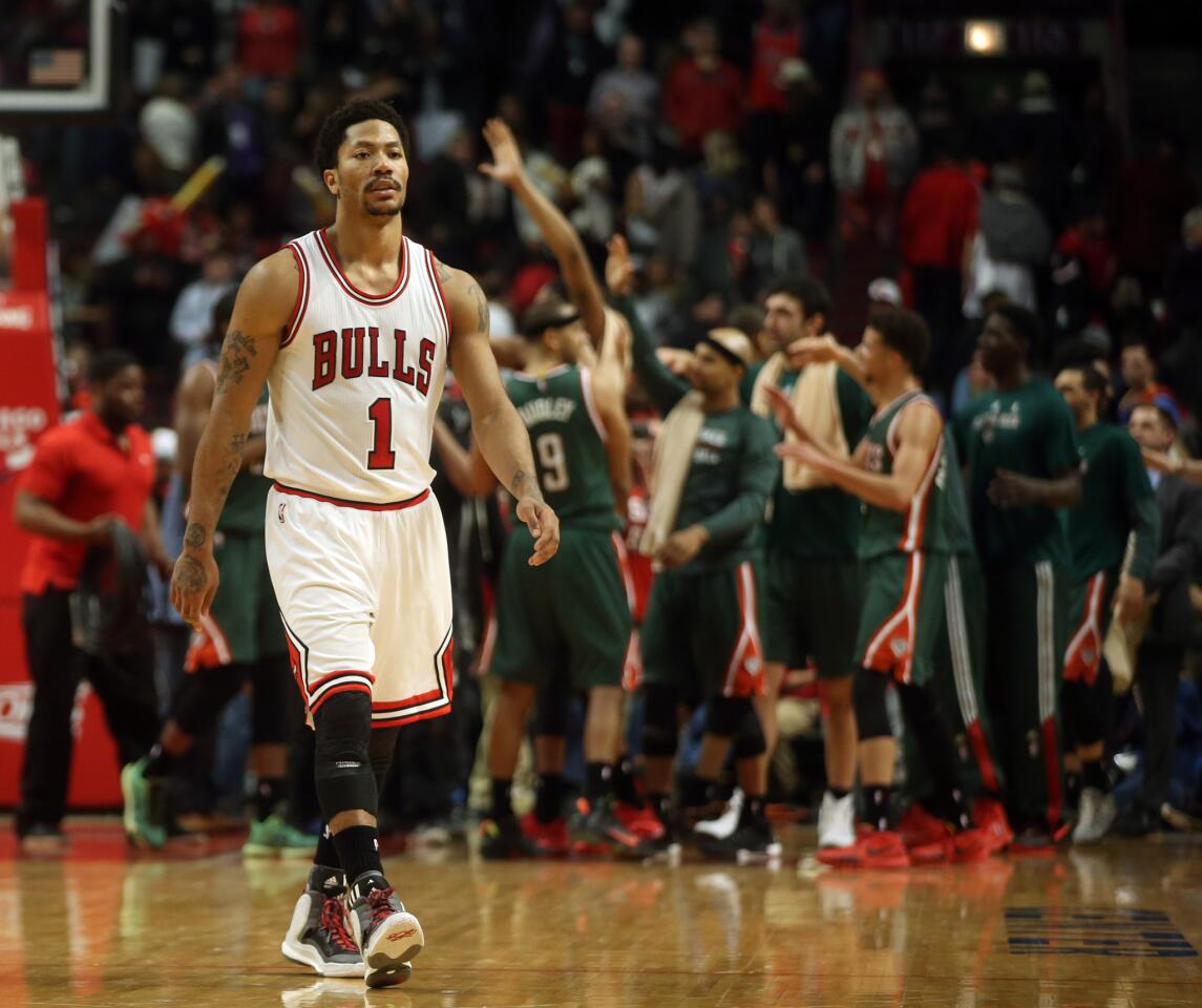 Derrick Rose walks off the court after the loss.
