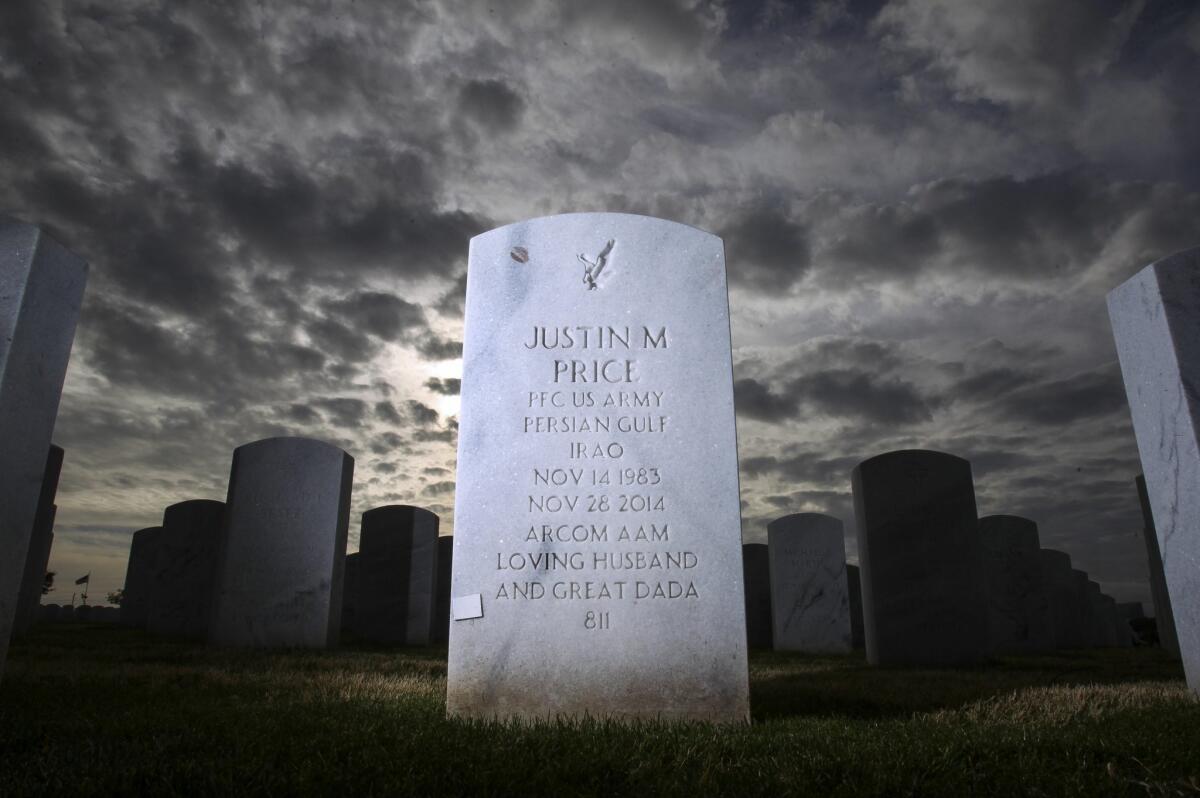 The headstone of Justin Price, an Iraq Army veteran who died by suicide, at Miramar National Cemetery in San Diego.