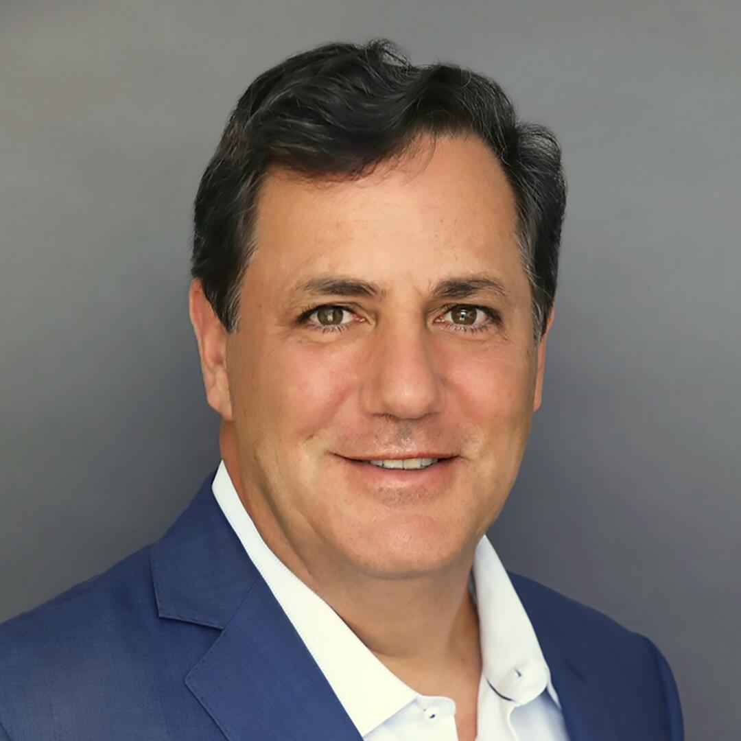 A portrait of Adam Bass