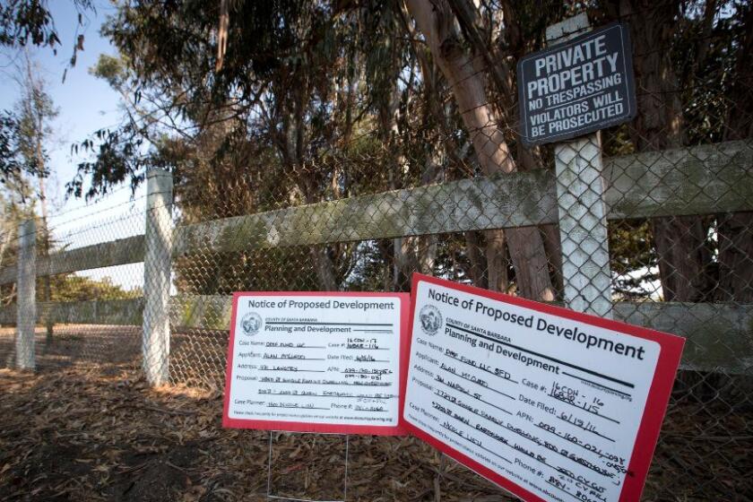 Notices of proposed development are posted along the coast near Gaviota, Calif.
