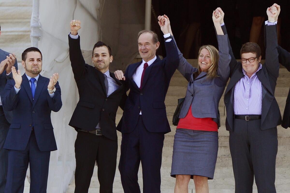 The plaintiffs' team in Hollingsworth vs. Perry, the California Proposition 8 case, celebrate after the U.S. Supreme Court's ruling was handed down. From left are Jeff Zarrillo, and his partner, Paul Katami, attorney David Boies, Sandy Stier and her partner, Kris Perry.