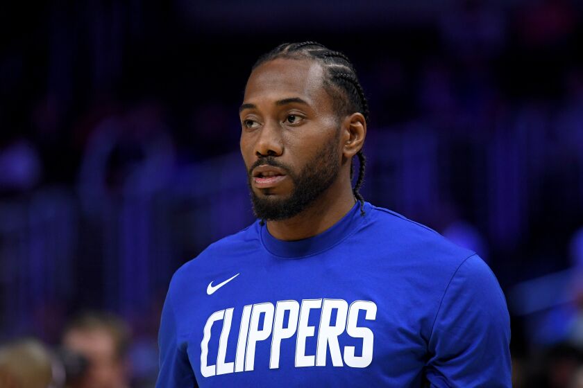 LOS ANGELES, CALIFORNIA - OCTOBER 10: Kawhi Leonard #2 of the LA Clippers during warm up before a preseason game against the Denver Nuggets at Staples Center on October 10, 2019 in Los Angeles, California. (Photo by Harry How/Getty Images)