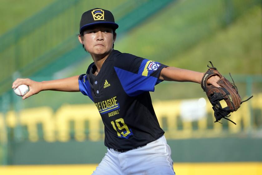 Torrance, Calif.'s Gibson Turner throws to a Sioux Falls, S.D., batter during the first inning of a baseball game at the Little League World Series in South Williamsport, Pa., Wednesday, Aug. 25, 2021. South Dakota won 1-0. (AP Photo/Tom E. Puskar)