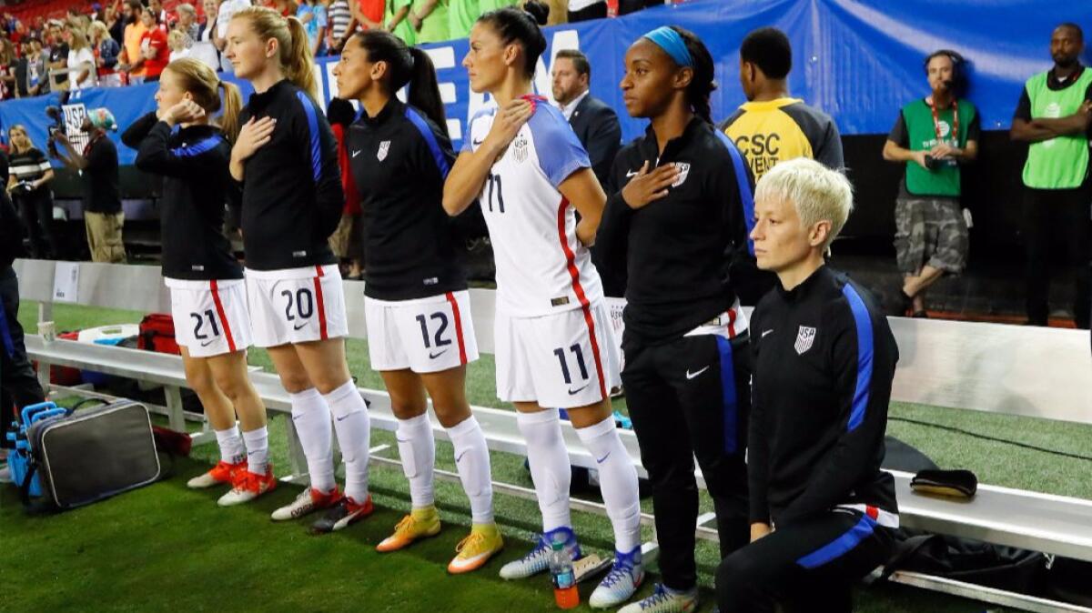 Megan Rapinoe kneels during the national anthem prior to the match between the United States and the Netherlands at the Georgia Dome on Sept. 18.