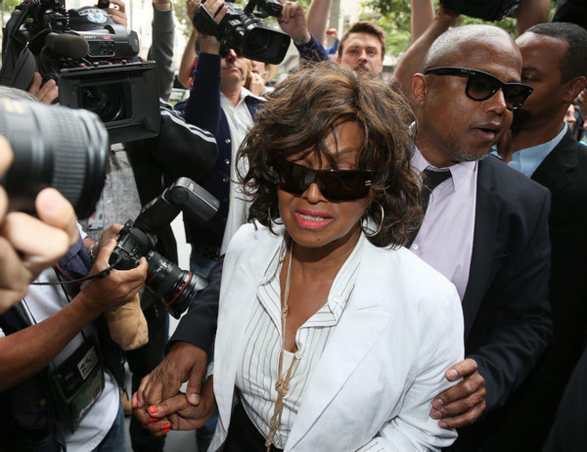 Rebbie Jackson, left, and Randy Jackson attend the first day of the family's suit against AEG.