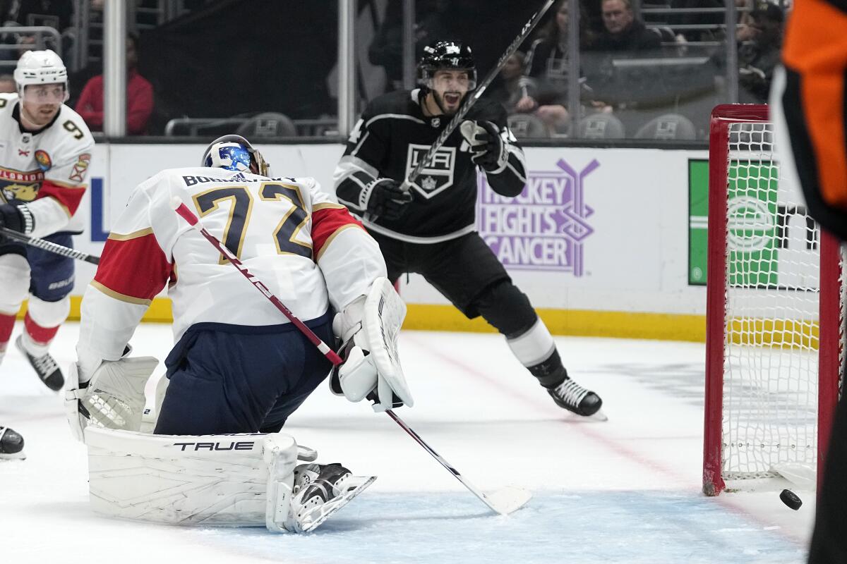 Florida's Sergei Bobrovsky is scored on by Trevor Moore as Kings teammate Phillip Danault, at top, celebrates Nov. 5, 2022.