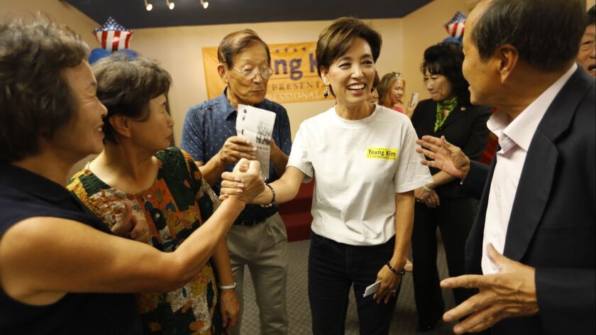 Former California Assemblywoman Young Kim, who's running for the 39th Congressional District, meets with supporters at her new campaign office in Rowland Heights.