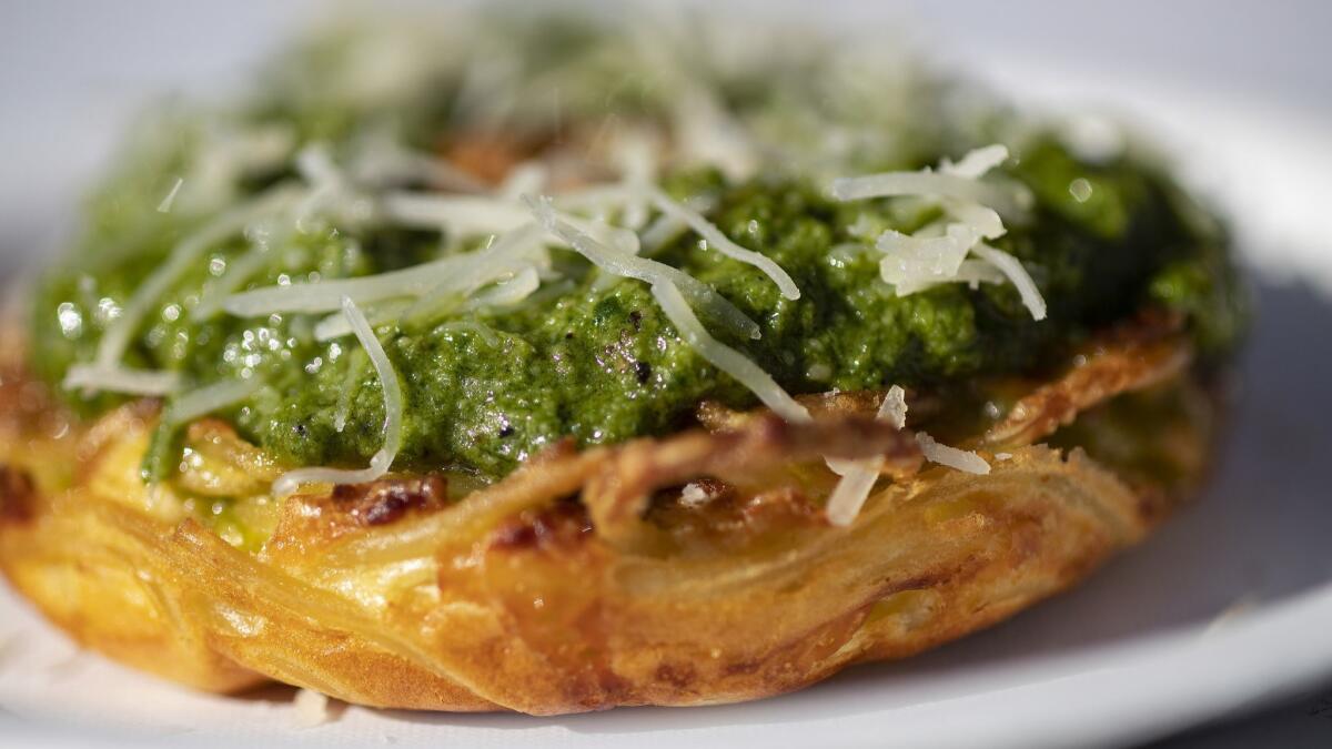 Pignotti's spaghetti doughnut with pesto sauce.