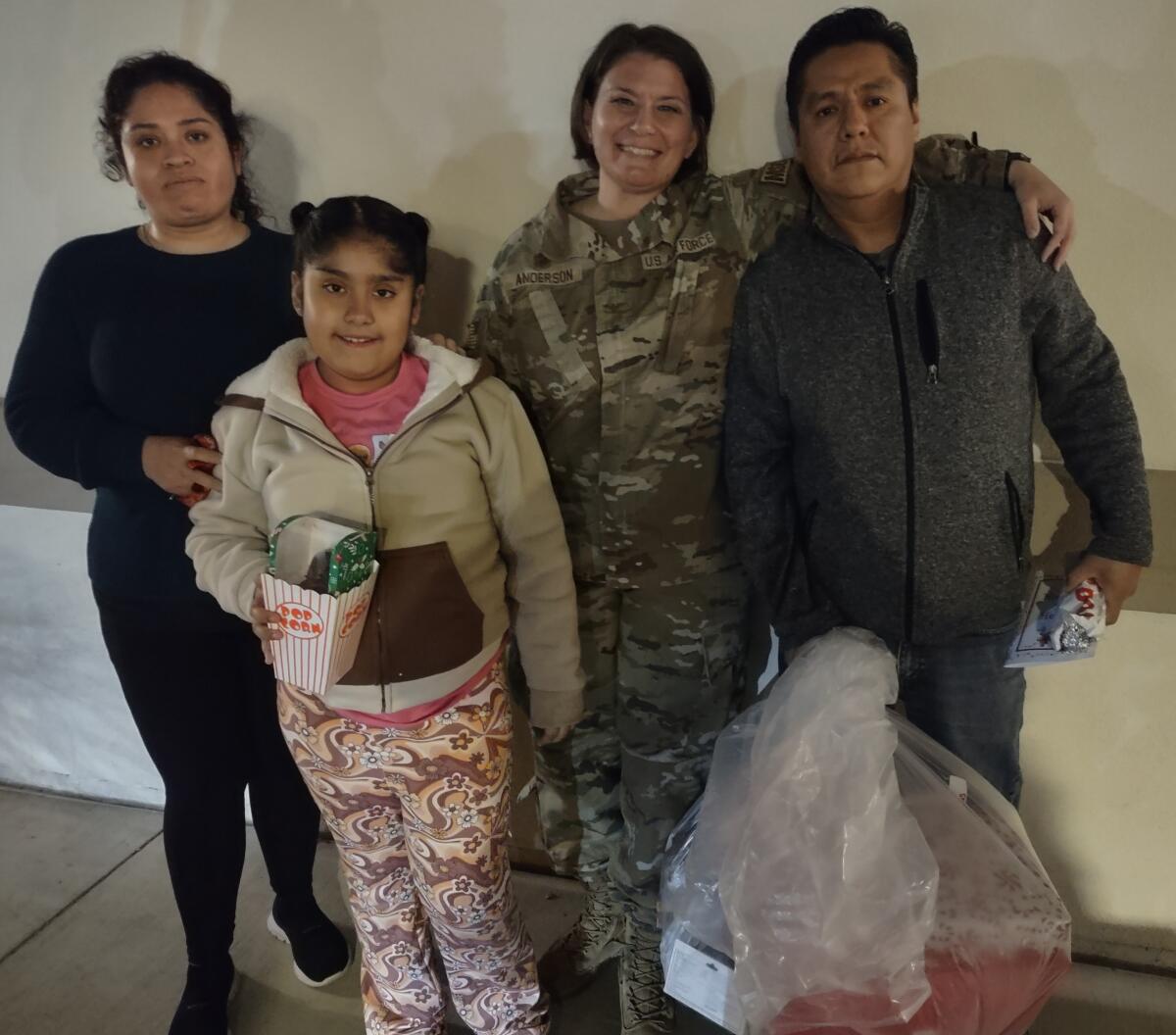 Air National Guard Colonel Sotera Anderson, second from right, with mom Blanca Campos, Jazmin Vargas, and dad Alfred Vargas.
