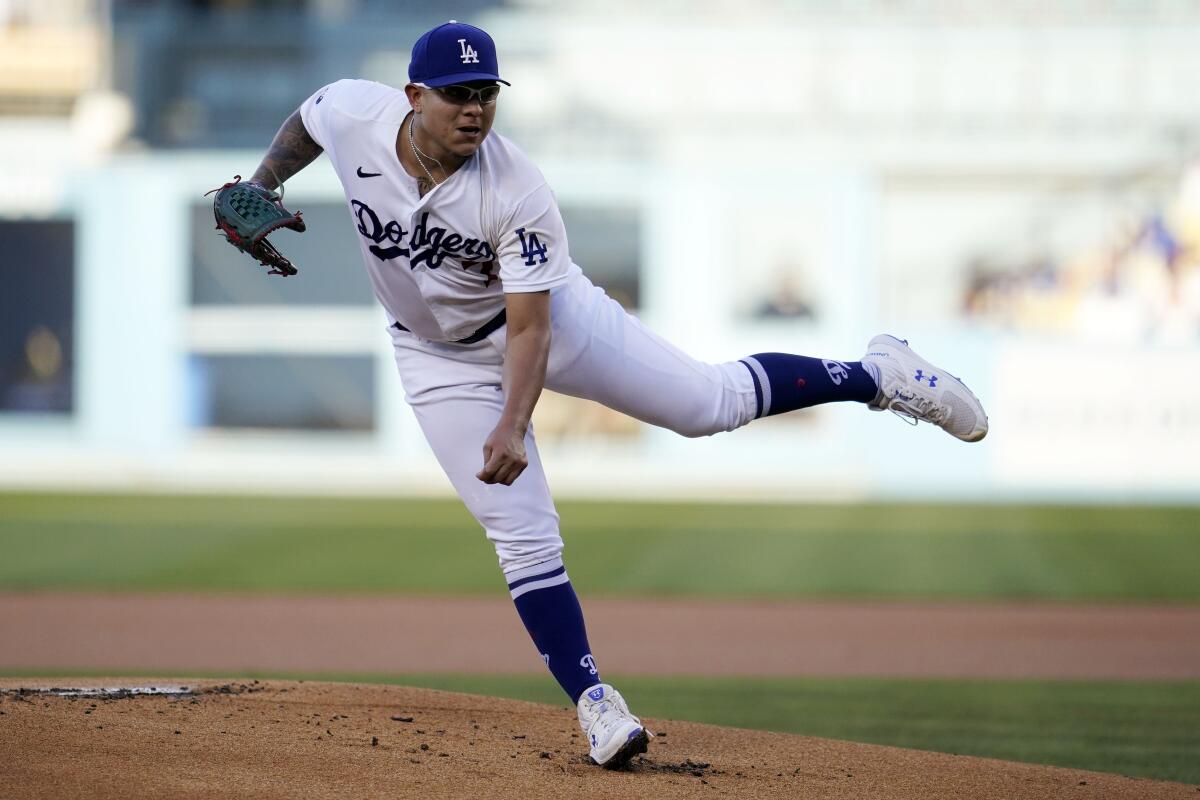 Dodgers starting pitcher Julio Urías throws to a San Diego Padres batter.