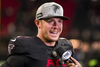 Atlanta Falcons quarterback Taylor Heinicke speaks during a media conference.