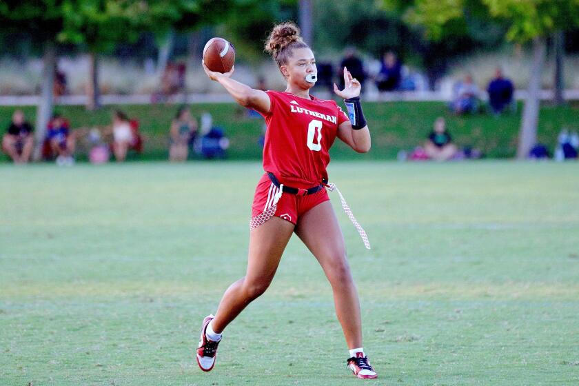 Orange Lutheran quarterback Makena Cook throws a pass.