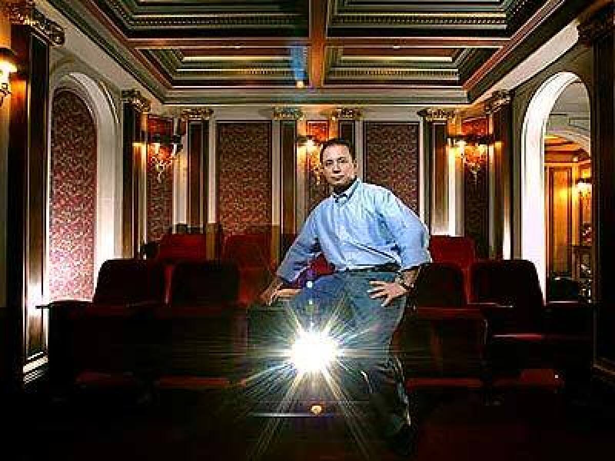 Theo Kalomirakis, in a private theater he designed in Rancho Palos Verdes. He started his business with three rows of old theater seats, and now does theaters featuring foyers, concession stands and state-of-the-art electronics for heads of state.
