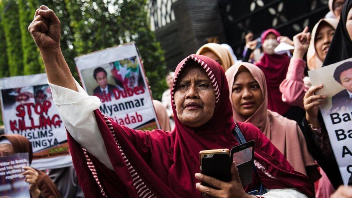 A women's group demonstrates outside the Myanmar Embassy in Jakarta, Indonesia, in protest of a crackdown against minority Rohingya Muslims.