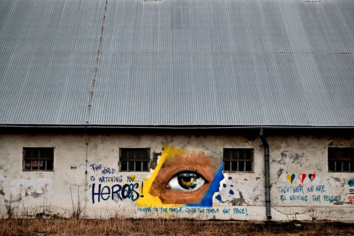 A mural was painted along an abandoned building.