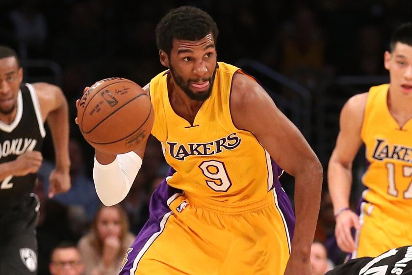 Lakers guard Ronnie Price drives to the basket during a loss to the Brooklyn Nets on Feb. 20.