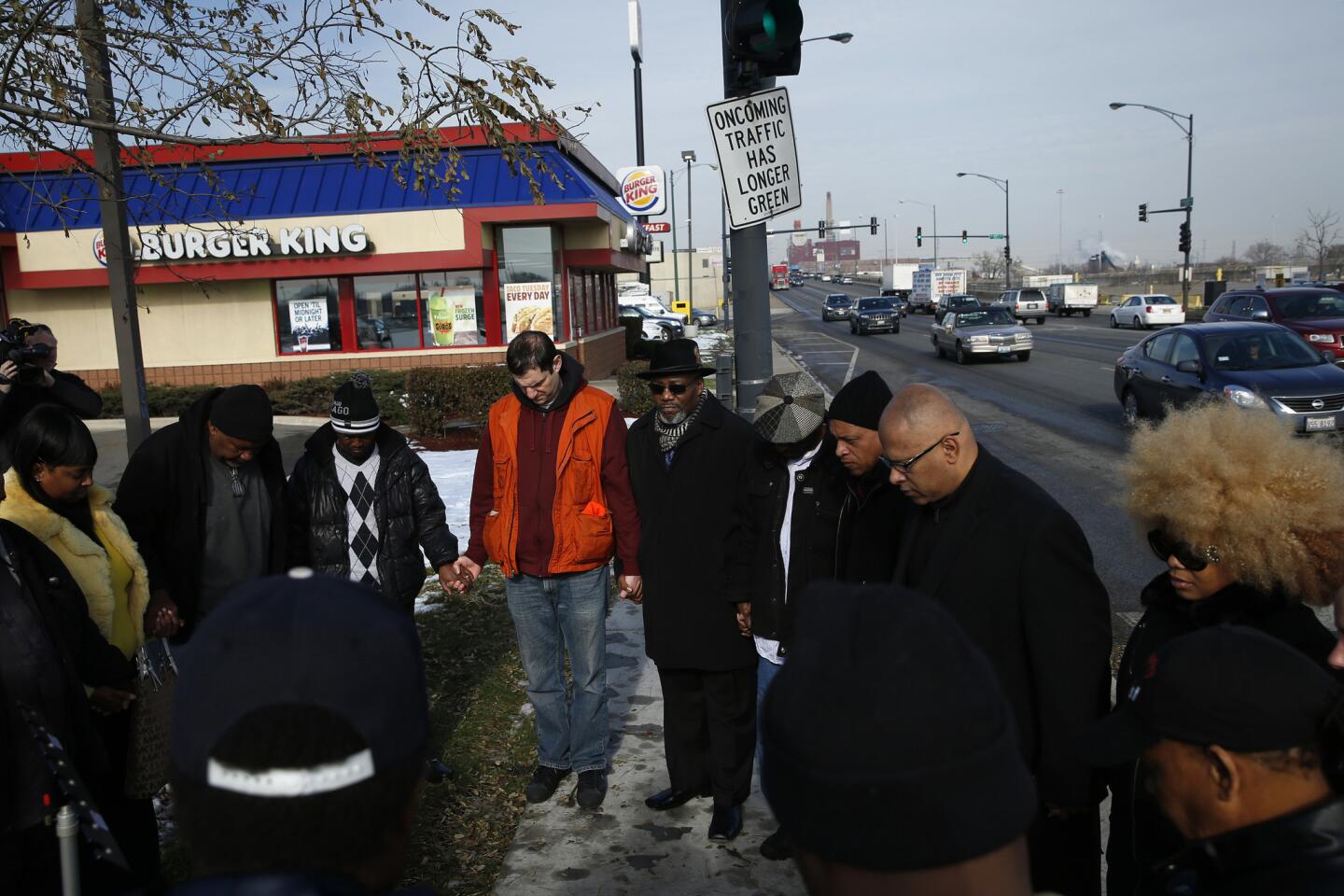 Community activists and residents gather to pay tribute to Laquan McDonald on Nov. 24, 2015, near the scene of his October 2014 death at 41st Street and Pulaski Road in Chicago.