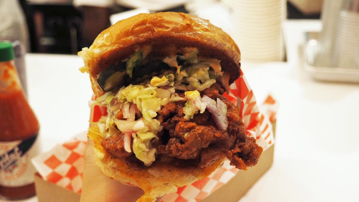 Shown is the hot chicken sandwich from the new Howlin' Ray's in Los Angeles' Chinatown.