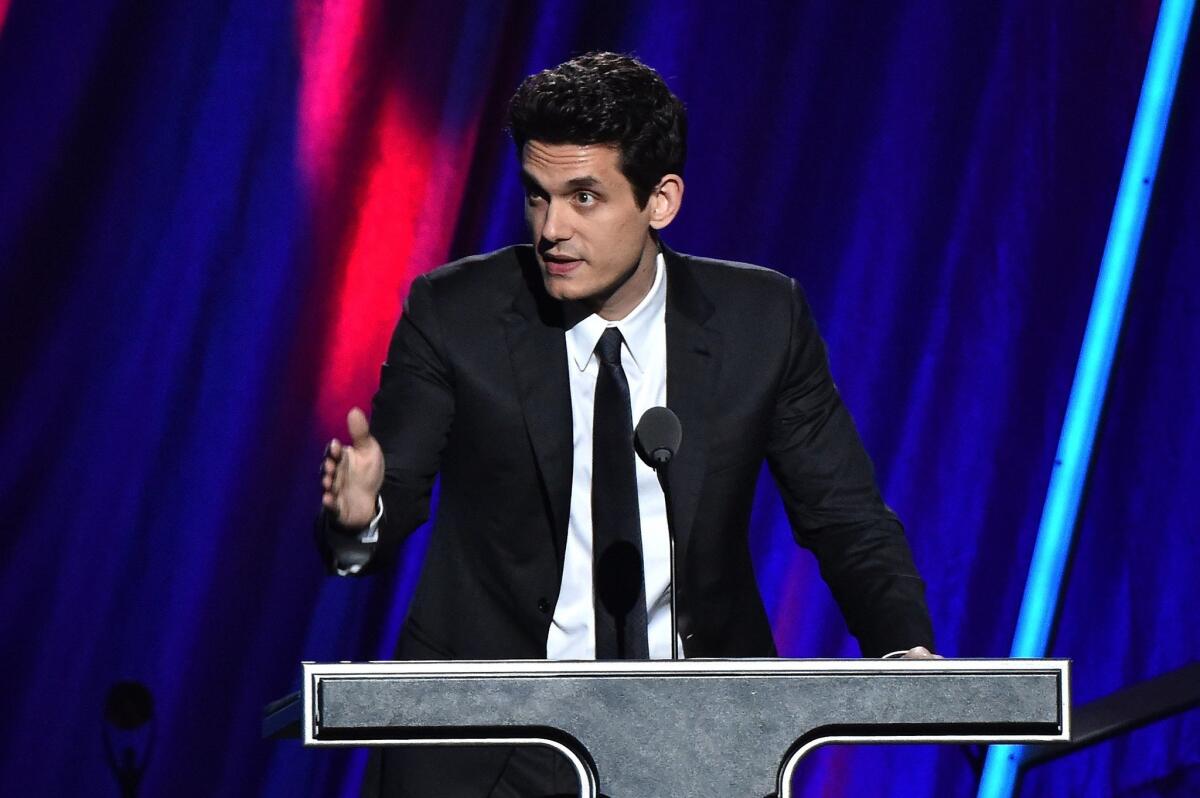 John Mayer inducts Stevie Ray Vaughan during the 30th Rock and Roll Hall of Fame induction ceremony Saturday night in Cleveland.