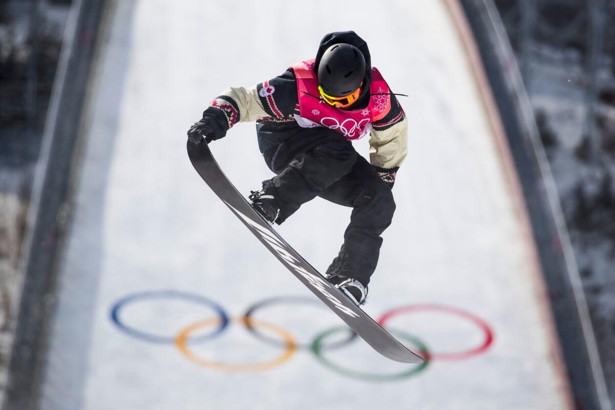Canada's Tyler Nicholson competes during the men's snowboard big air qualification.