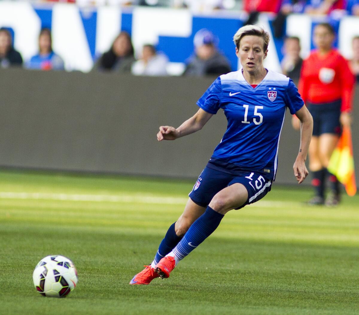 United States midfielder Megan Rapinoe dribbles against Mexico during a friendly in Carson, Calif., in 2015. Rapinoe, openly gay, called out Brazilian fans for using an anti-gay slur during the U.S. team's Olympic match with New Zealand: "It is personally hurtful."