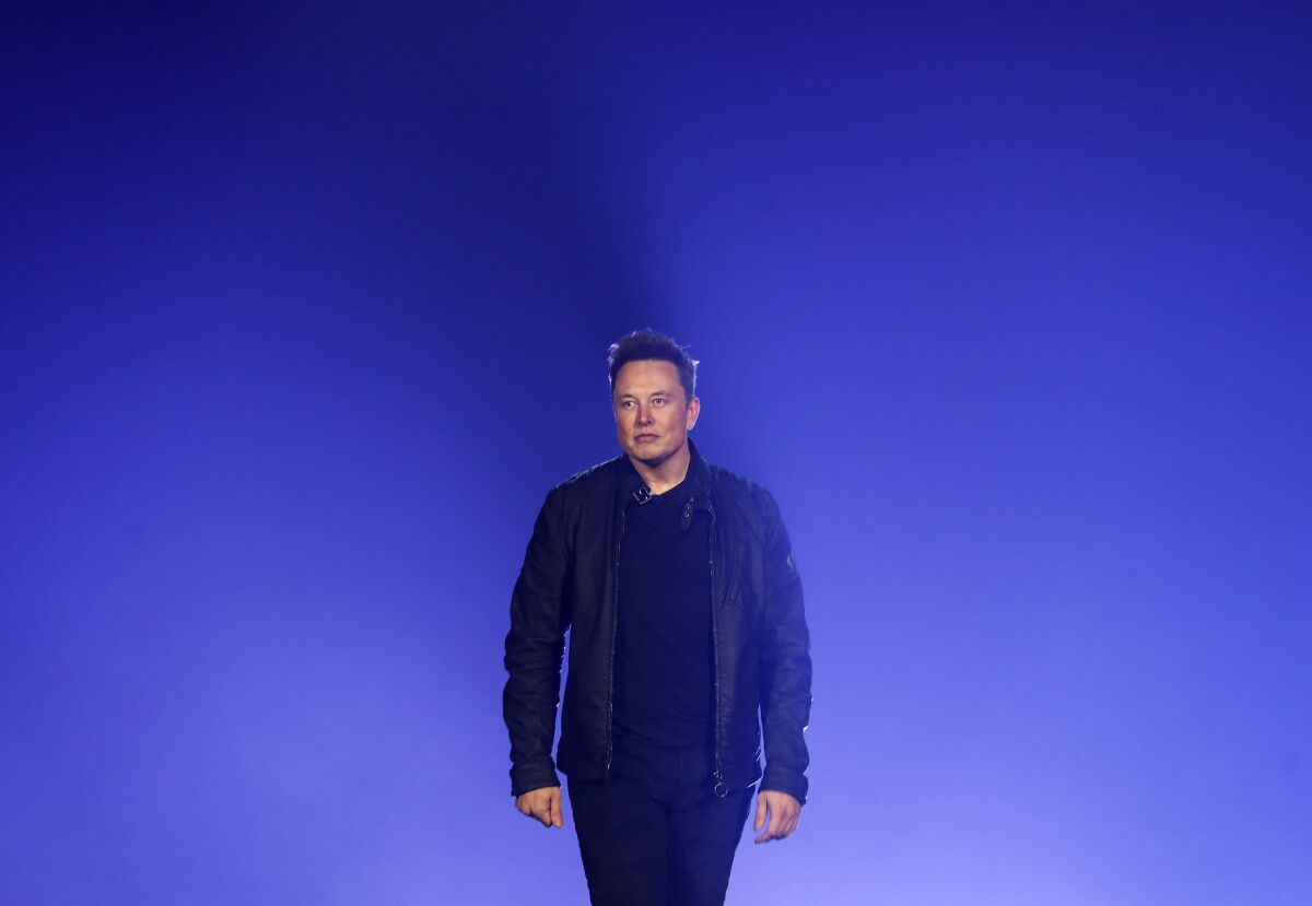 FILE - Tesla CEO Elon Musk introduces the Cybertruck at Tesla's design studio on Nov. 21, 2019, in Hawthorne, Calif. Days after taking over Twitter and a week before the 2022 U.S. midterm elections, Musk has positioned himself as moderator-in-chief of one of the most important social media platforms in American politics. (AP Photo/Ringo H.W. Chiu, File)