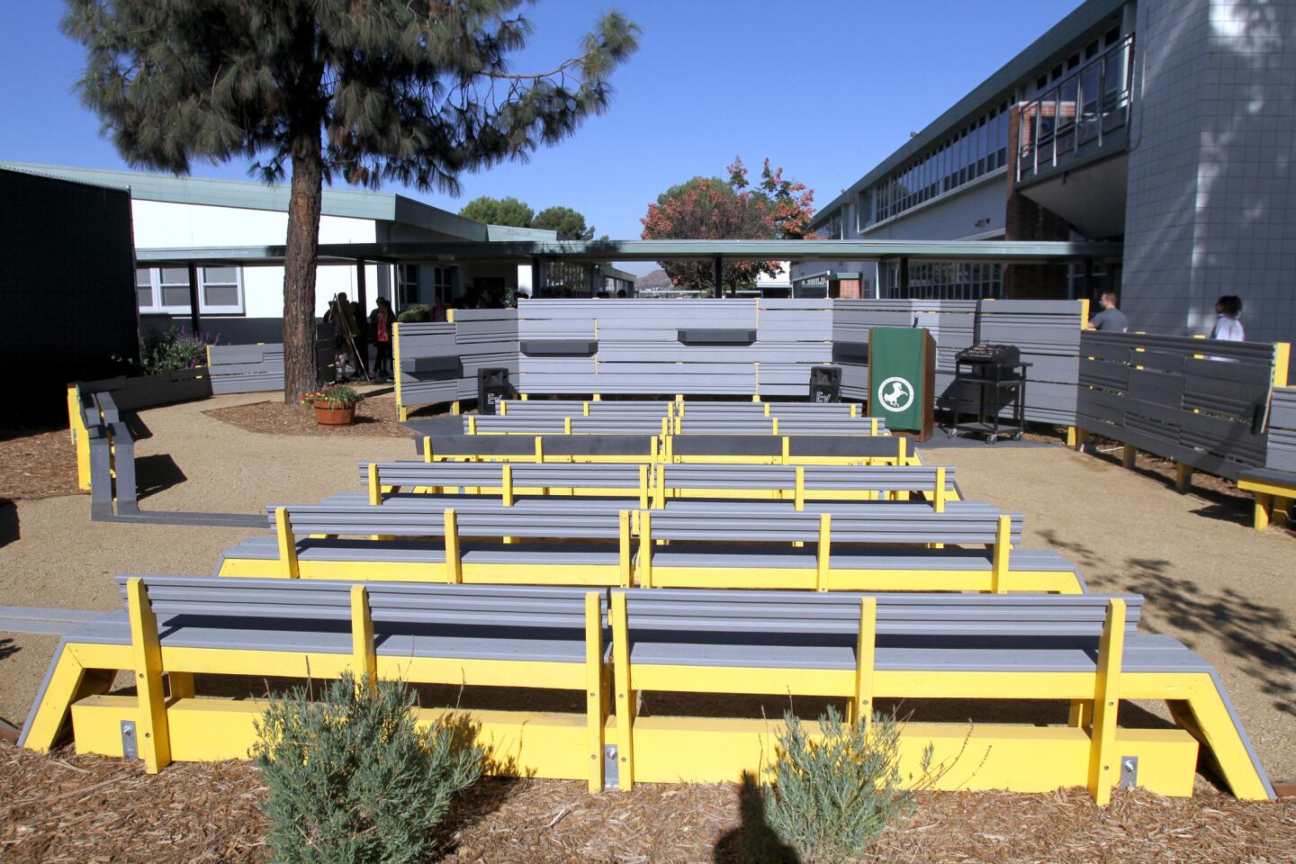 A new outdoor classroom was dedicated at John Muir Middle School, in Burbank on Friday, October 21, 2016. The classroom was made possible with the assistance of Woodbury University architectural students, who designed and built the composite wood classroom and Nickelodeon volunteers, who did the landscaping.