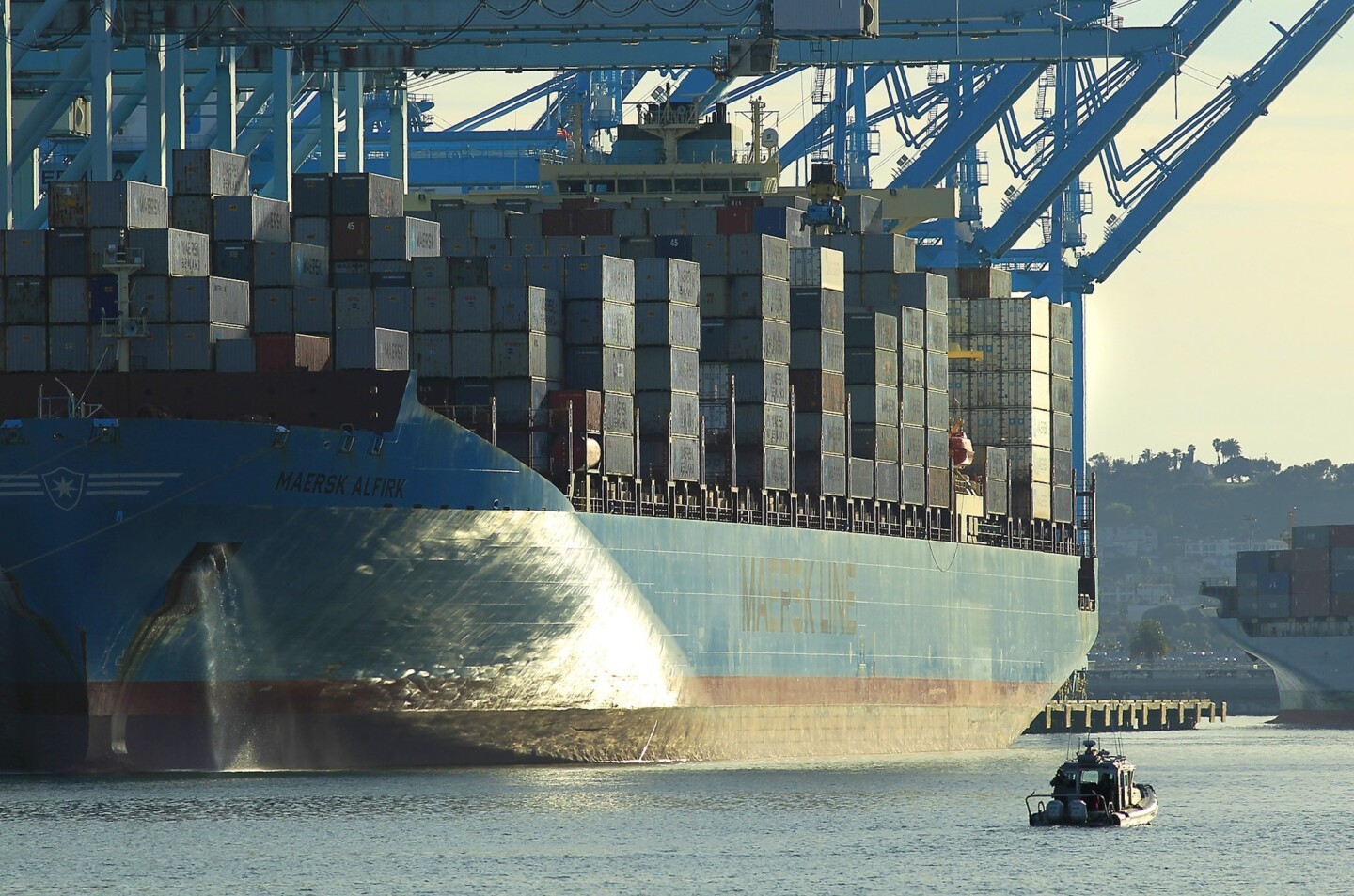 A container ship is docked in the Port of Los Angeles on Terminal Island.