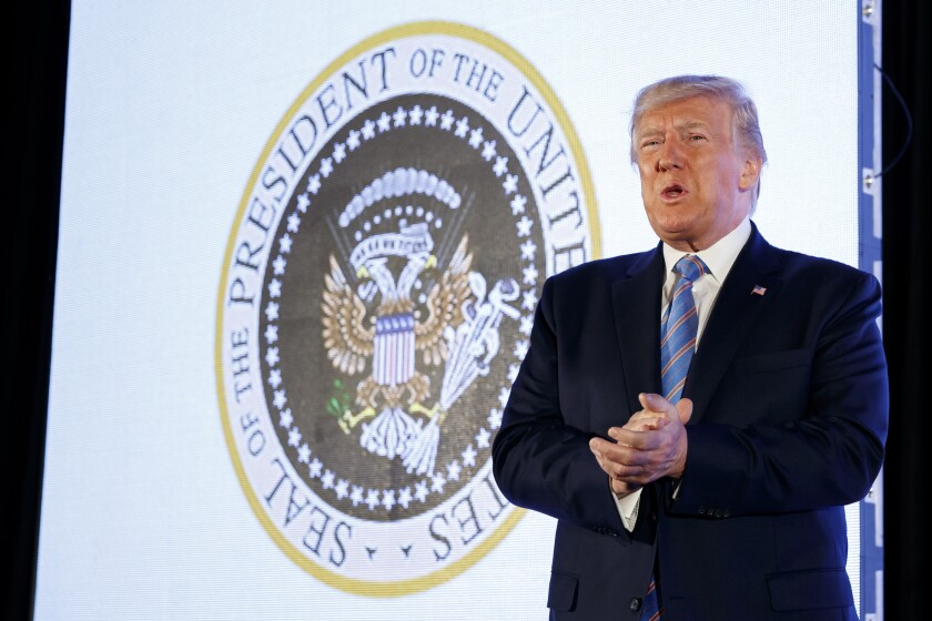 President Trump by an altered presidential seal at Turning Point USA's Teen Student Action Summit 2019, July 23, in Washington.