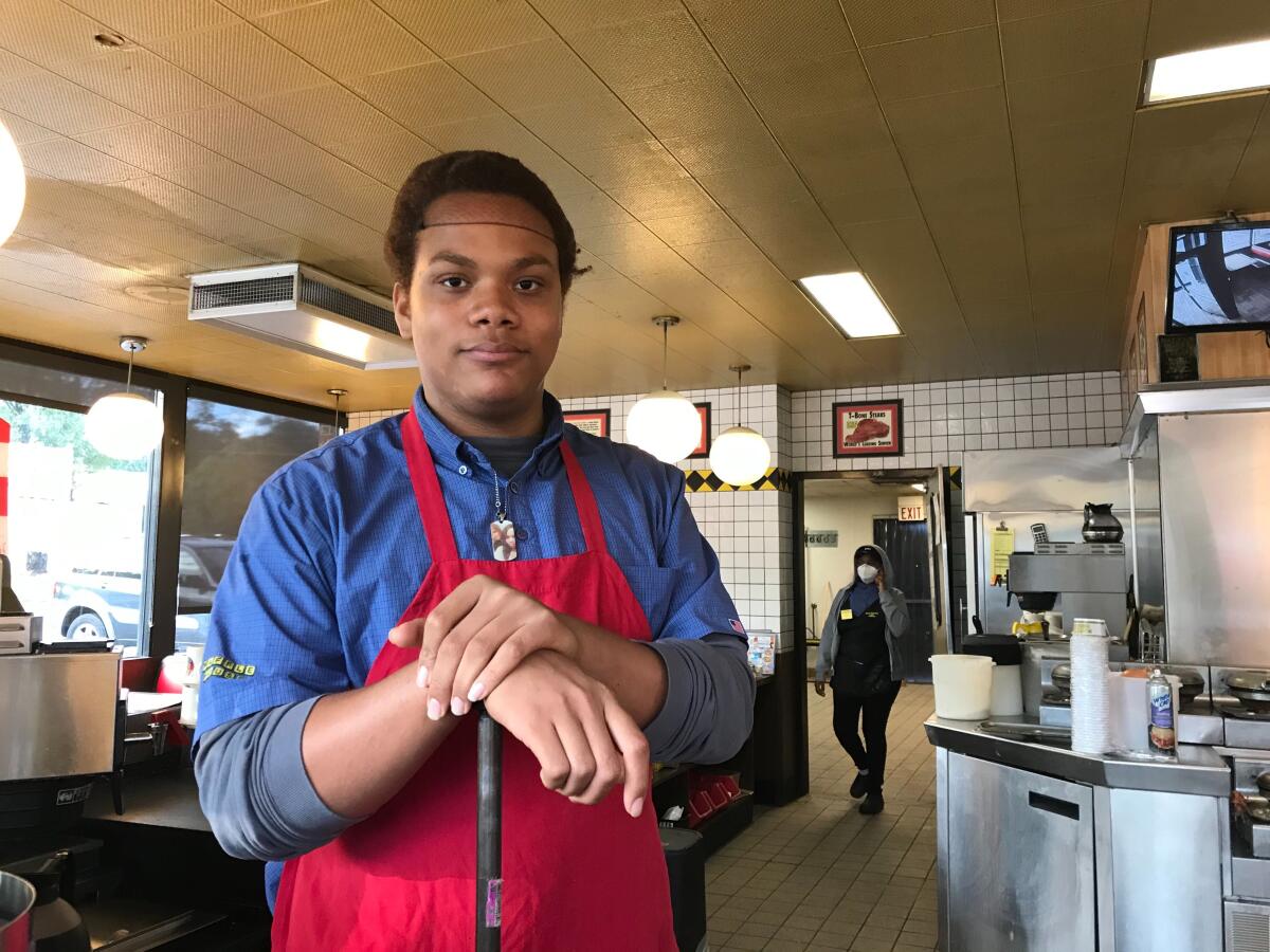 Carlos Mckibben, 19, a Waffle House cook, said he was nervous about working in the diner as the company had taken few precautions to protect them from COVID-19. But he said he needed to earn money to pay his $420 a week in rent.