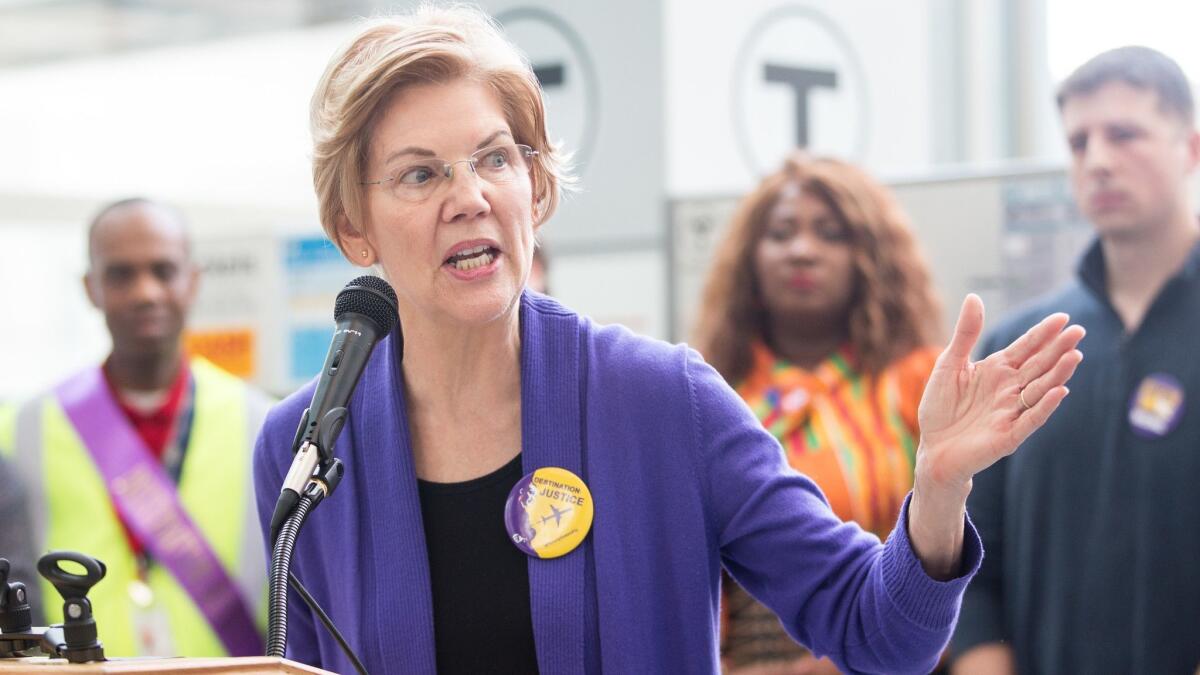 Sen. Elizabeth Warren (D-Mass.) speaks during a rally for airport workers affected by the government shutdown at Boston Logan International Airport on Jan. 21.