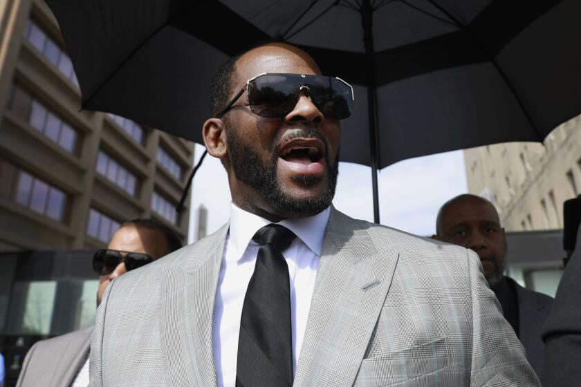 FILE - In this June 6, 2019, file photo, musician R. Kelly leaves the Leighton Criminal Court building in Chicago. Lifetime is readying a follow-up series to "Surviving R. Kelly" called “Surviving R. Kelly Part II: The Reckoning” with one major difference: This time, R Kelly will be behind bars when it airs. (AP Photo/Amr Alfiky, File)