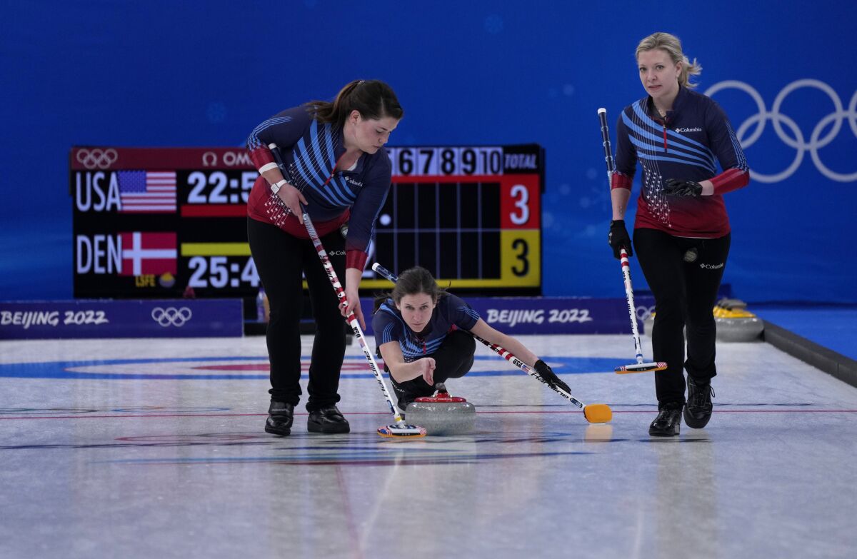 United States' Tabitha Peterson, throws a rock, during the women's curling match against Denmark, at the 2022 Winter Olympics, Thursday, Feb. 10, 2022, in Beijing. (AP Photo/Nariman El-Mofty)