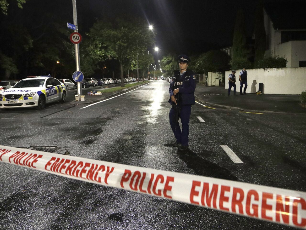 A police officer patrols at a cordon near a mosque in central Christchurch, New Zealand.