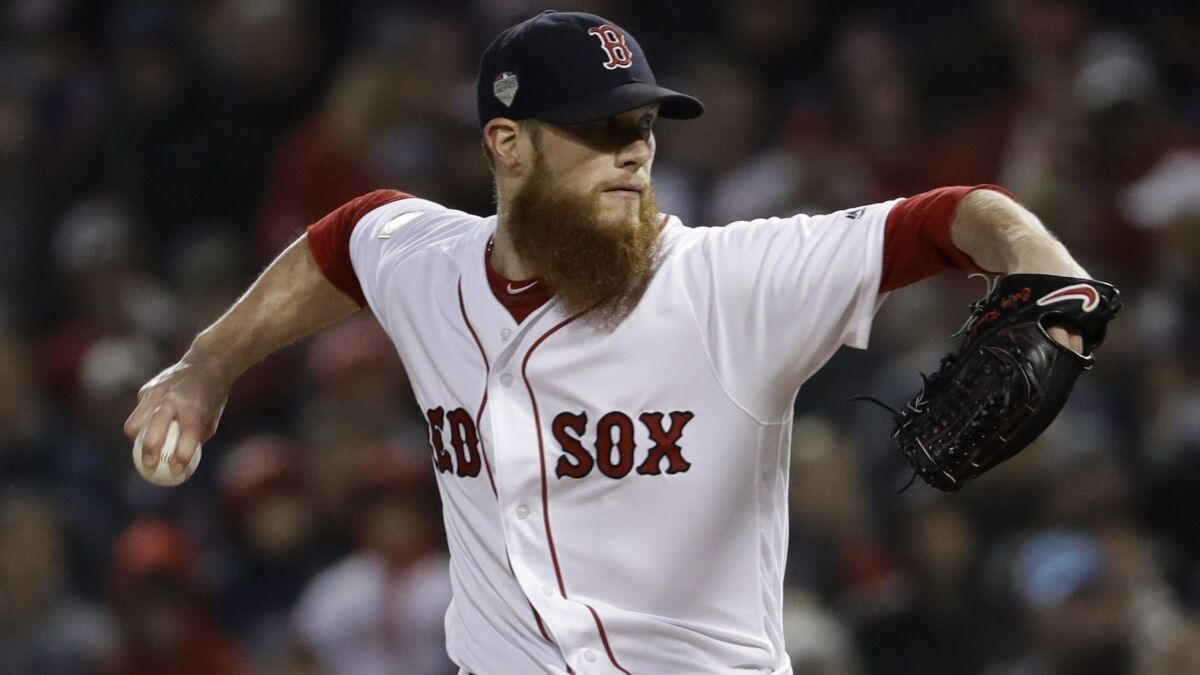 Boston Red Sox's Craig Kimbrel throws during the ninth inning of Game 1 of the World Series baseball against the Dodgers on Oct. 23, 2018 in Boston.