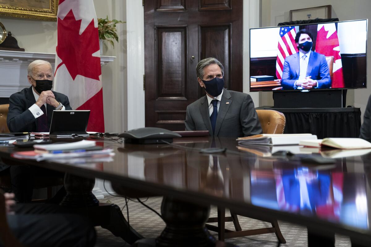 President Biden, Secretary of State Antony Blinken and Canadian Prime Minister Justin Trudeau speak virtually