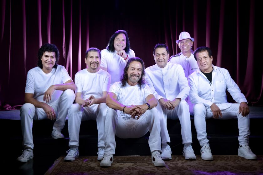 Legendary Mexican grouper band Los Bukis are photographed at a rehearsal studio
