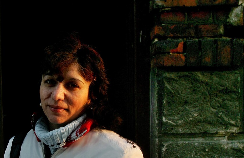 FILE - In this file photo dated Monday, Jan. 16, 2006, Elena Gorolova poses in Ostrava, Czech Republic. Dozens of roma women, including Gorolova were illegally sterilized in Sept. 1990, according to findings by the country's ombudsman. The lower house of Czech Parliament on Friday June 4, 2021, has approved legislation to compensate Roma women sterilized against their will. (AP Photo/Petr David Josek, FILE)