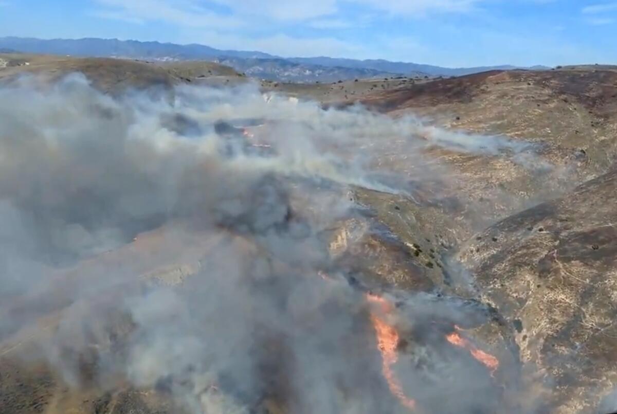 Ventura County firefighters on Saturday were battling a brush fire 