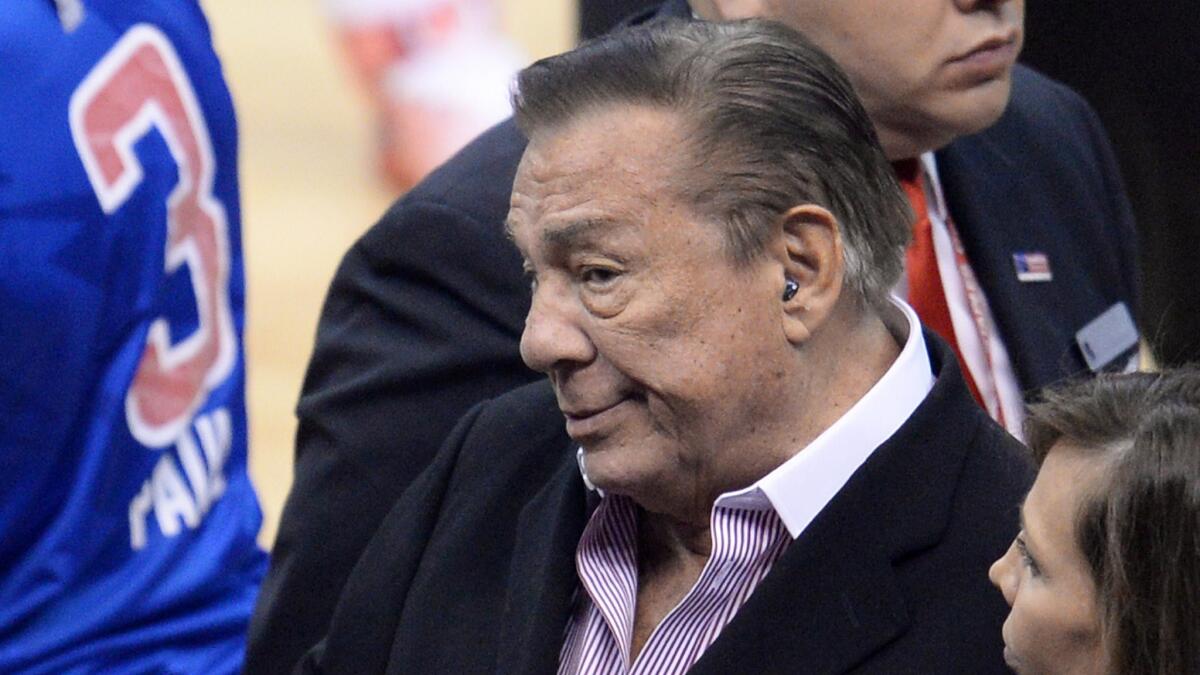 Clippers owner Donald Sterling attends a playoff game between the Clippers and Golden State Warriors on April 21. The Lakers have issued a statement condemning racist statements allegedly made by Sterling.