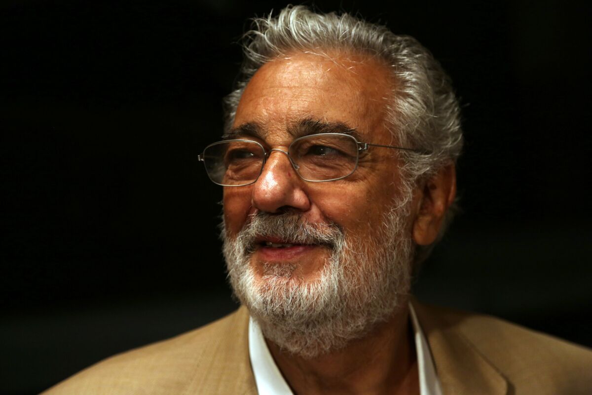 Placido Domingo resigned as Los Angeles Opera's general director and said he has withdrawn from all scheduled performances in L.A.