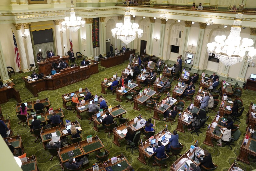 Members of the California state Assembly meet at the Capitol in Sacramento, Calif., Monday, June 20, 2022. California lawmakers will vote on a nearly $308 billion state budget, Wednesday, June 29. (AP Photo/Rich Pedroncelli)