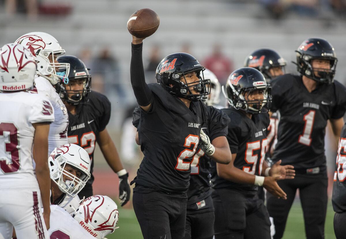 Los Amigos' Maysen Navarro celebrates after scoring in the first half against Ocean View.