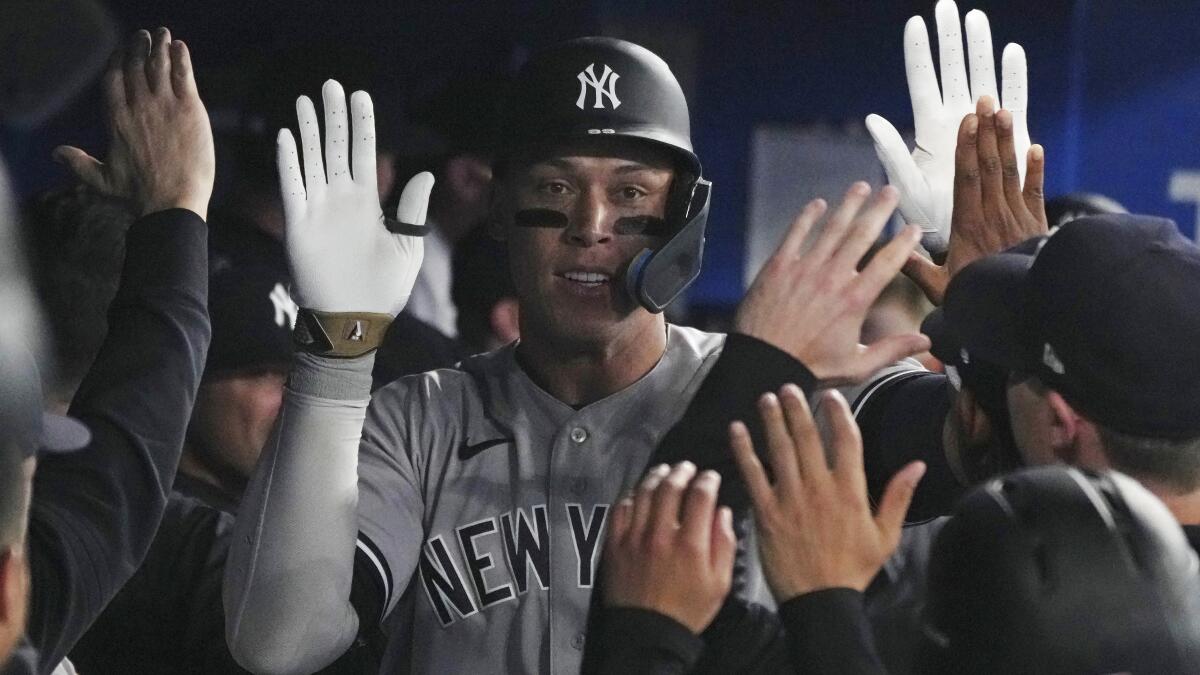 Judge HR in 8th breaks maple leaf sign in deep center, sends