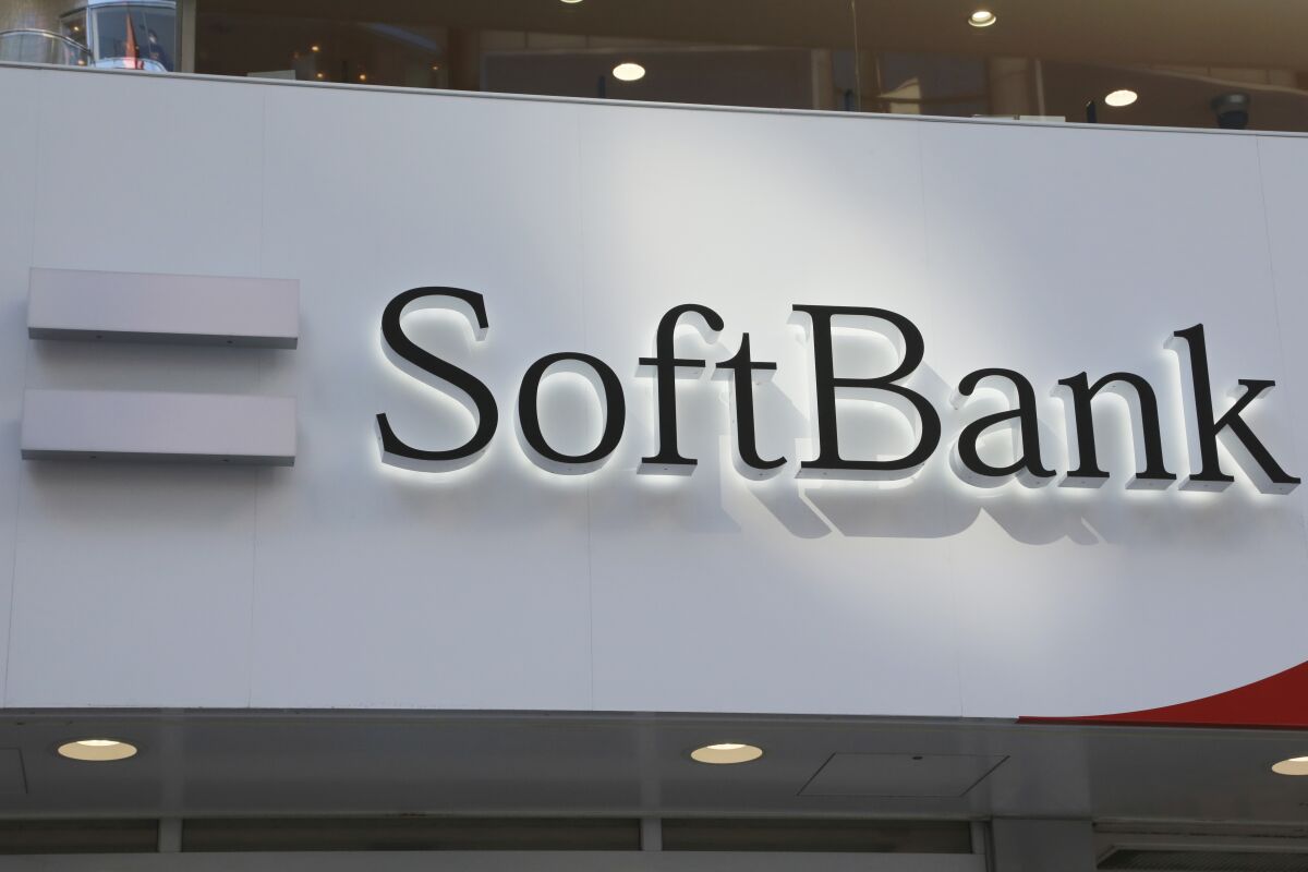 The logo of SoftBank Corp. is seen at its shop in Tokyo, Monday, Feb. 7, 2022. Profit at Japanese technology investor SoftBank tumbled 98% in the quarter through December, as the value of its sprawling investments declined and its planned sale of British company Arm collapsed. (AP Photo/Koji Sasahara)