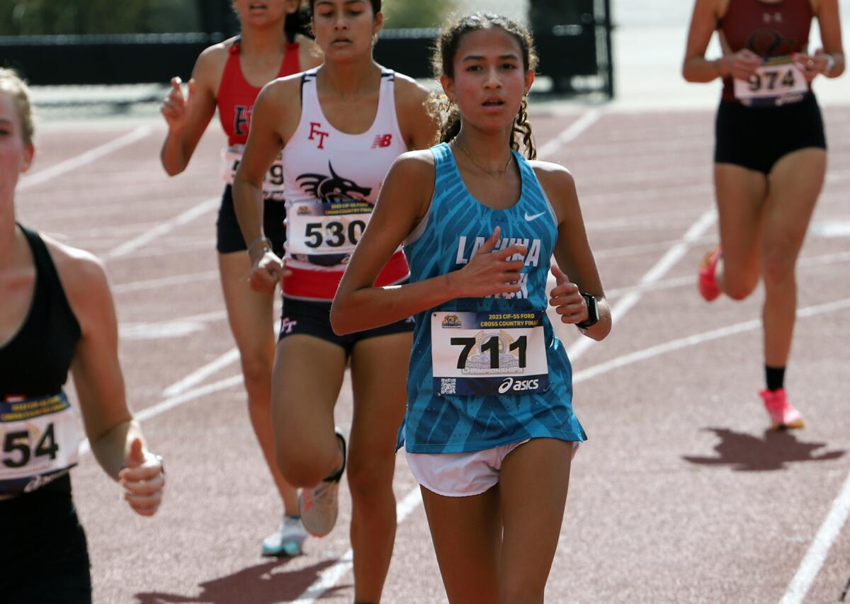 Laguna Beach's Hayden Joseph (711) competes in the Division 4 girls' race in the CIF finals at Mt. SAC on Saturday.